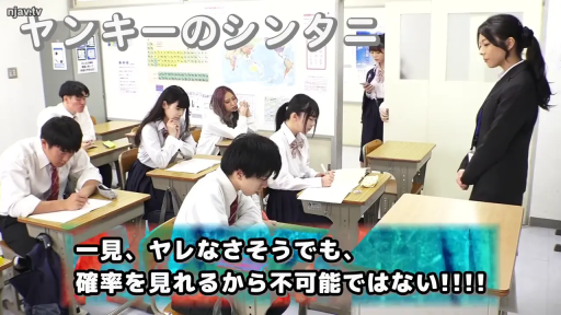 认真 · 教室 · 深色西装外套 · 教鞭 · 学生听课侧面