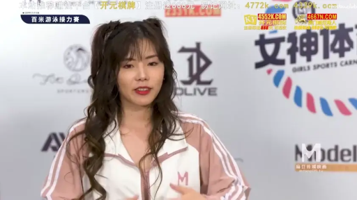 站姿 · 微笑 · 半身特写 · 录制 · 双马尾 · 运动外套 · 活动现场背景